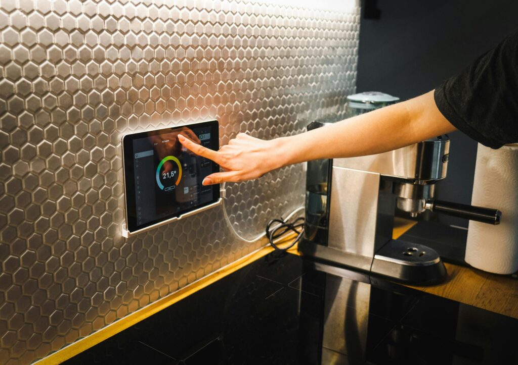 Vesta Security Business Image a person using a touch screen device